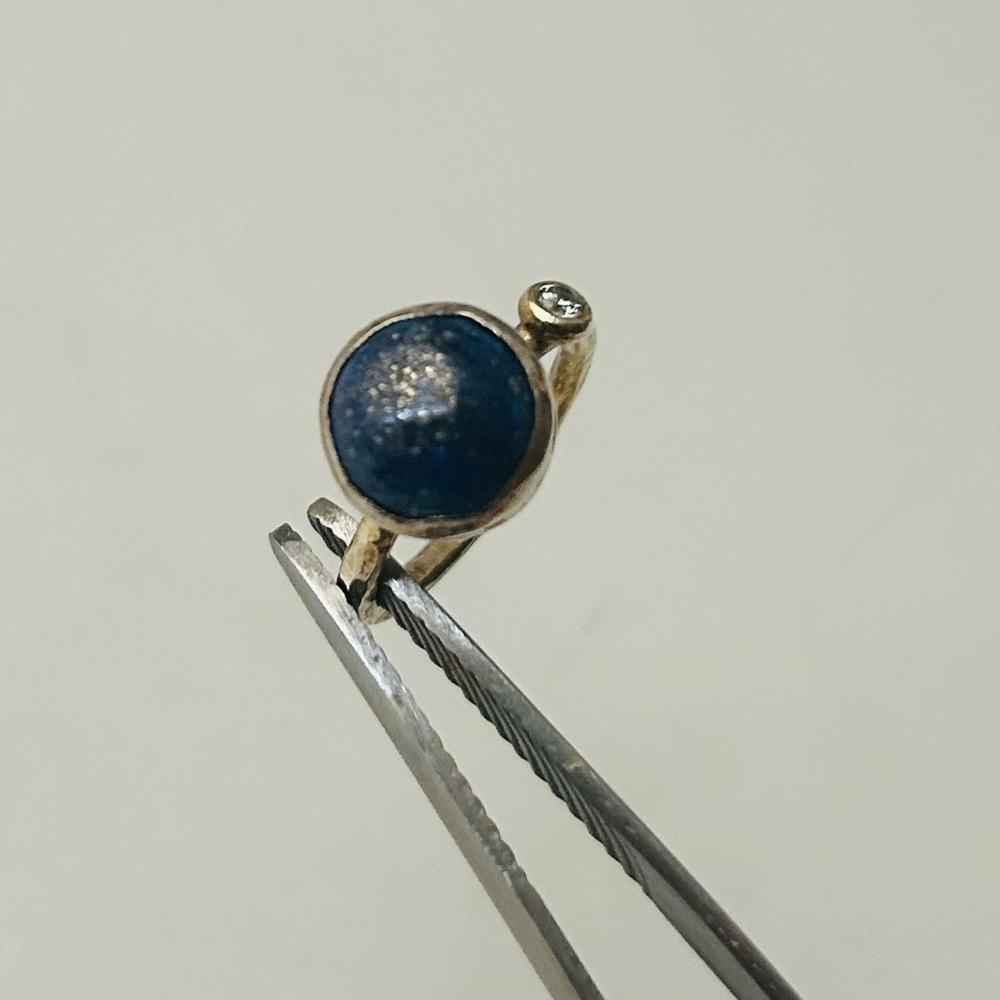 Lapis Lazuli blue stone ring with diamond and wide hammered gold band